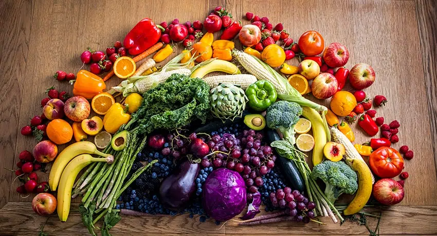Assorted colorful nutrient-rich fruits, grains, and greens